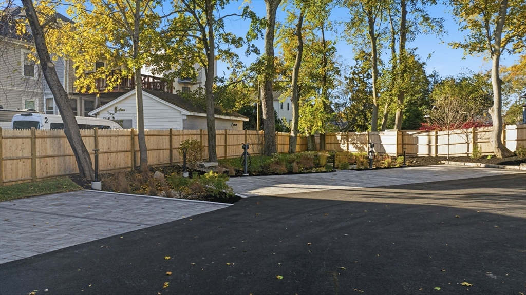 11 Boynton Street, Unit 103 Swampscott, MA 01907 - Photo 4 of 42 a view of street along with trees