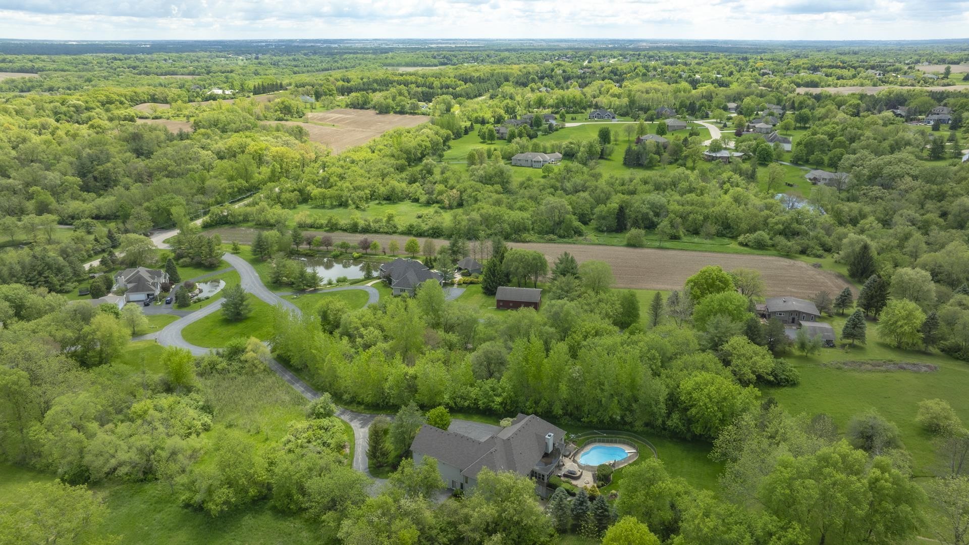 873 Olson Spring Close, Unit CLOSE Belvidere, IL 61008 - Photo 4 of 5 a view of a garden with an outdoor space