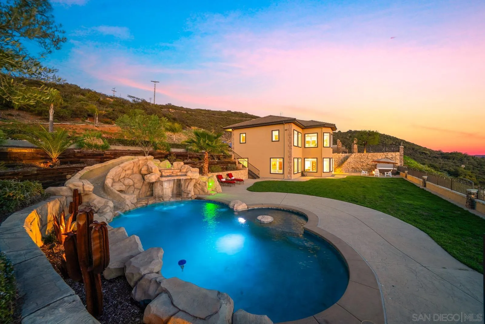 13170 Rancho Heights Road Pala, CA 92059 - Photo 2 of 75 a view of a swimming pool with a patio
