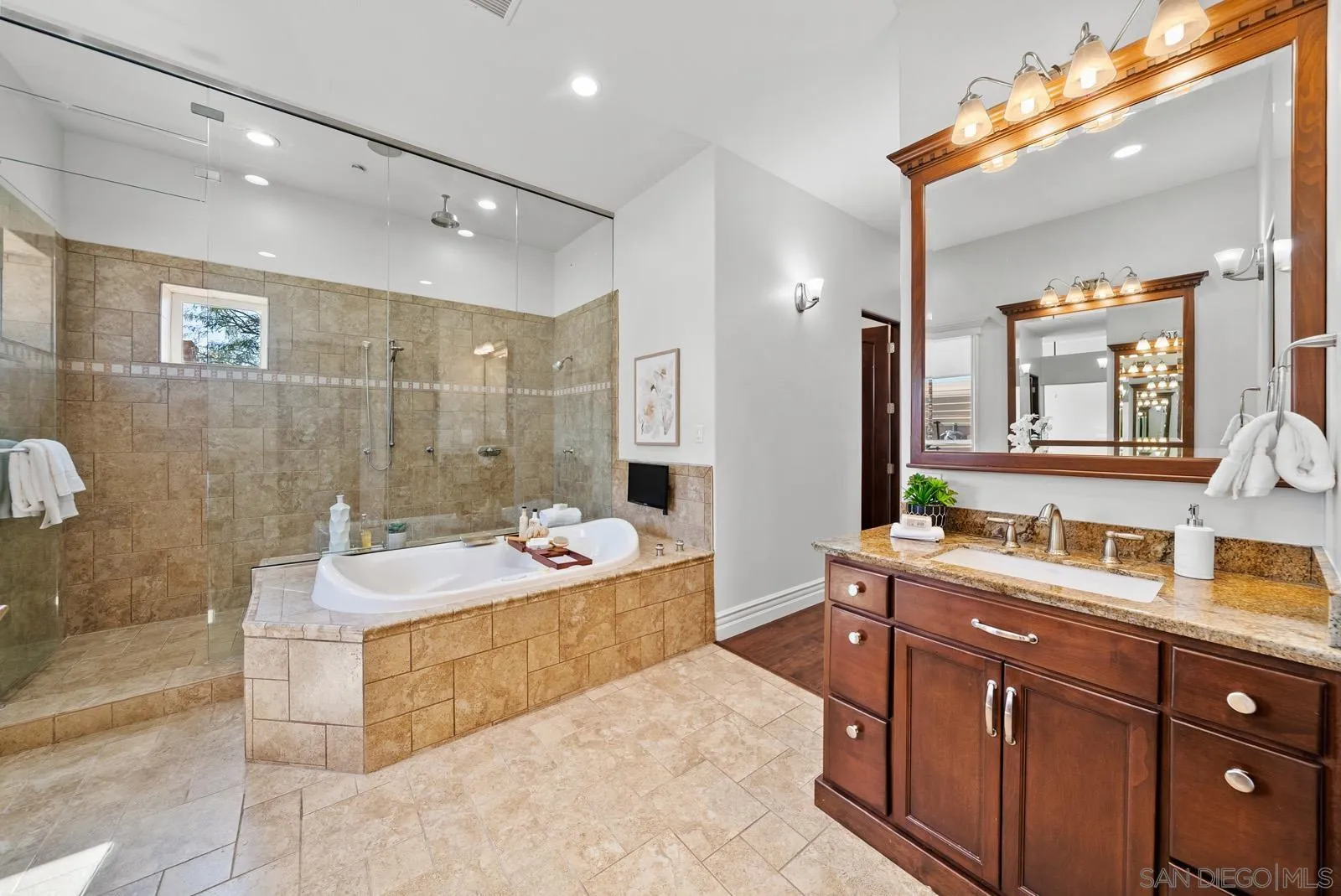13170 Rancho Heights Road Pala, CA 92059 - Photo 22 of 75 a spacious bathroom with a tub sink shower and mirror