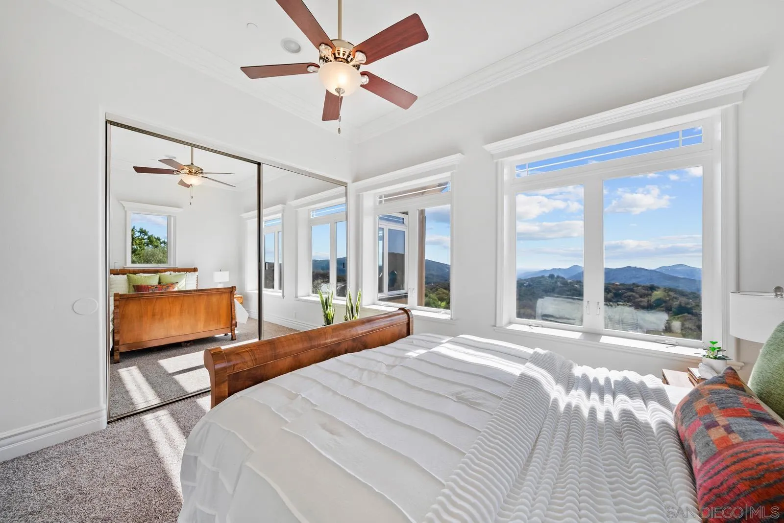 13170 Rancho Heights Road Pala, CA 92059 - Photo 27 of 75 a bedroom with a bed and a large window