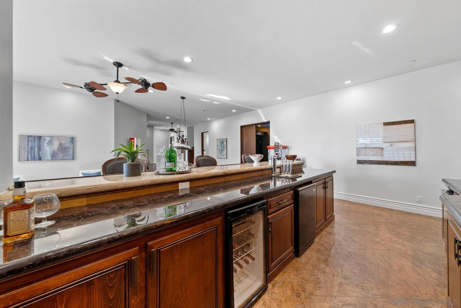 13170 Rancho Heights Road Pala, CA 92059 - Photo 32 of 75 a kitchen with kitchen island granite countertop a sink stainless steel appliances and cabinets