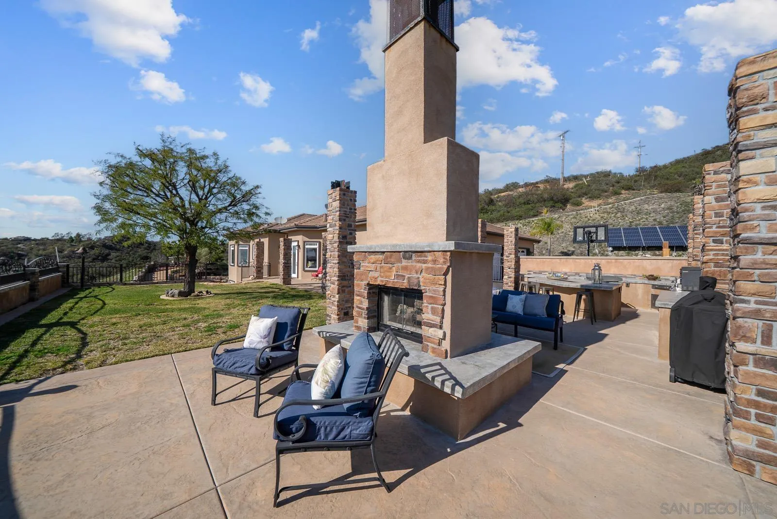 13170 Rancho Heights Road Pala, CA 92059 - Photo 50 of 75 a view of a patio with couches and a table and chairs