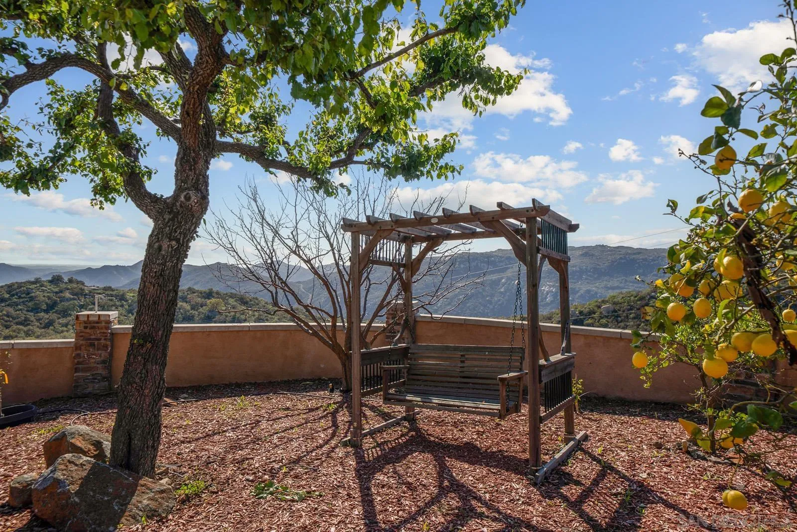 13170 Rancho Heights Road Pala, CA 92059 - Photo 58 of 75 a backyard of a house with lots of green space