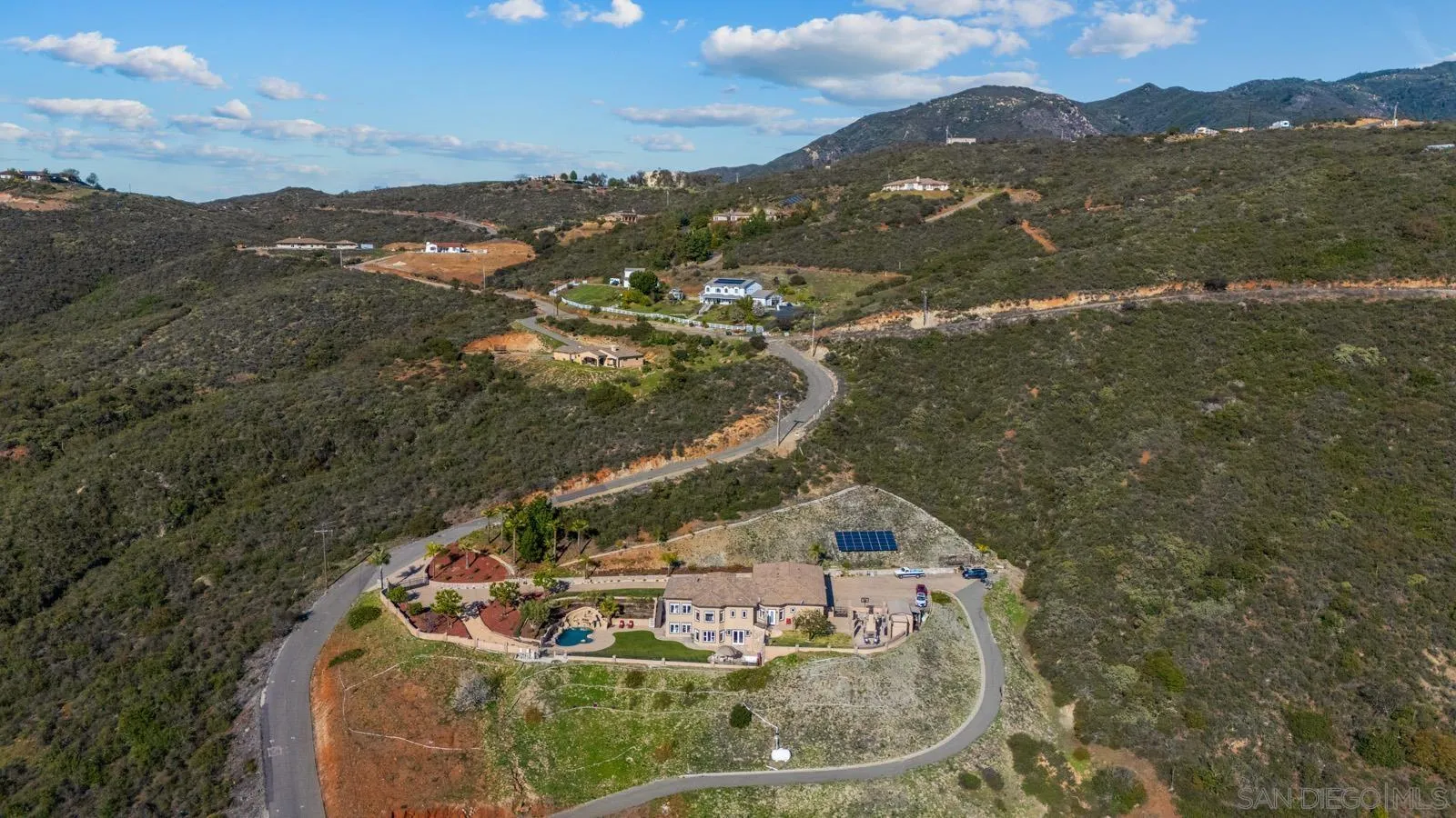 13170 Rancho Heights Road Pala, CA 92059 - Photo 71 of 75 a view of a house with a mountain in the background