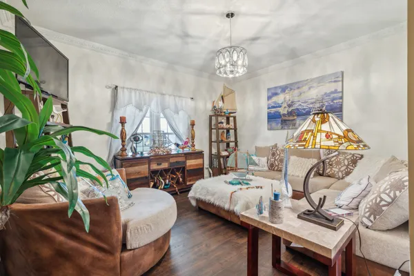 a bedroom with a bed and a table in it