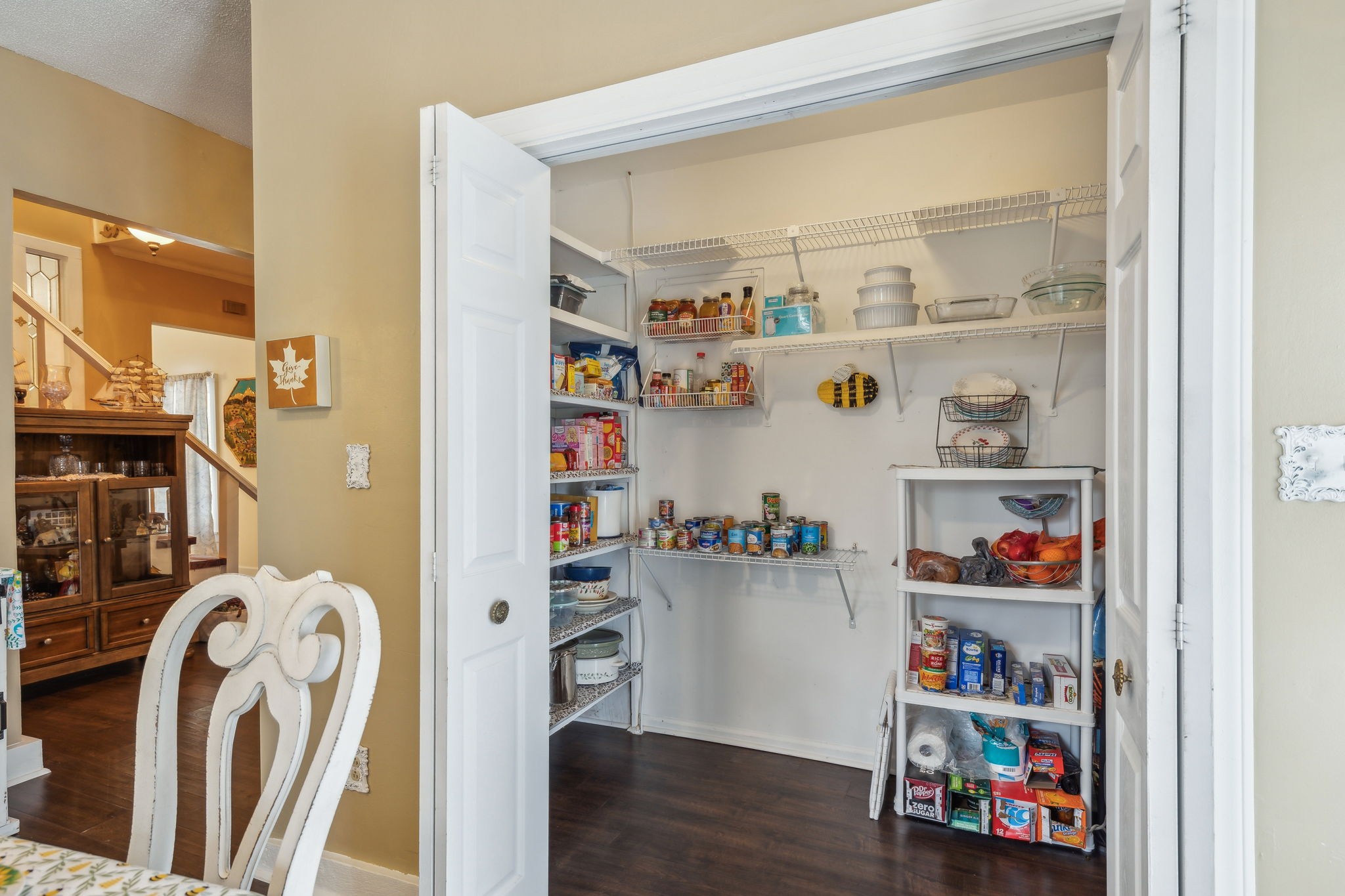 479 Elora Road Elora, TN 37328 - Photo 20 of 57 a room with a refrigerator and a wooden floor