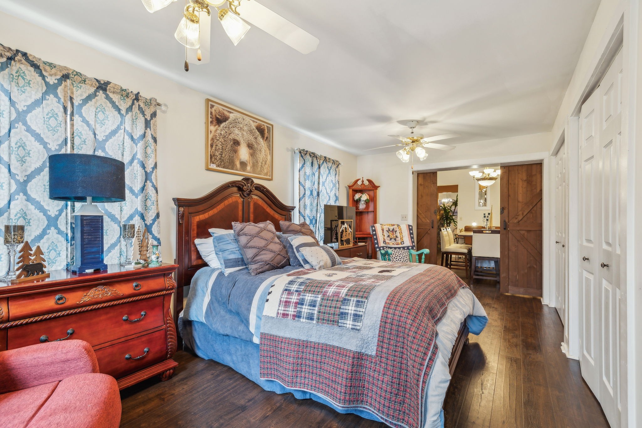 479 Elora Road Elora, TN 37328 - Photo 28 of 57 a bed room with a bed and a painting on the wall