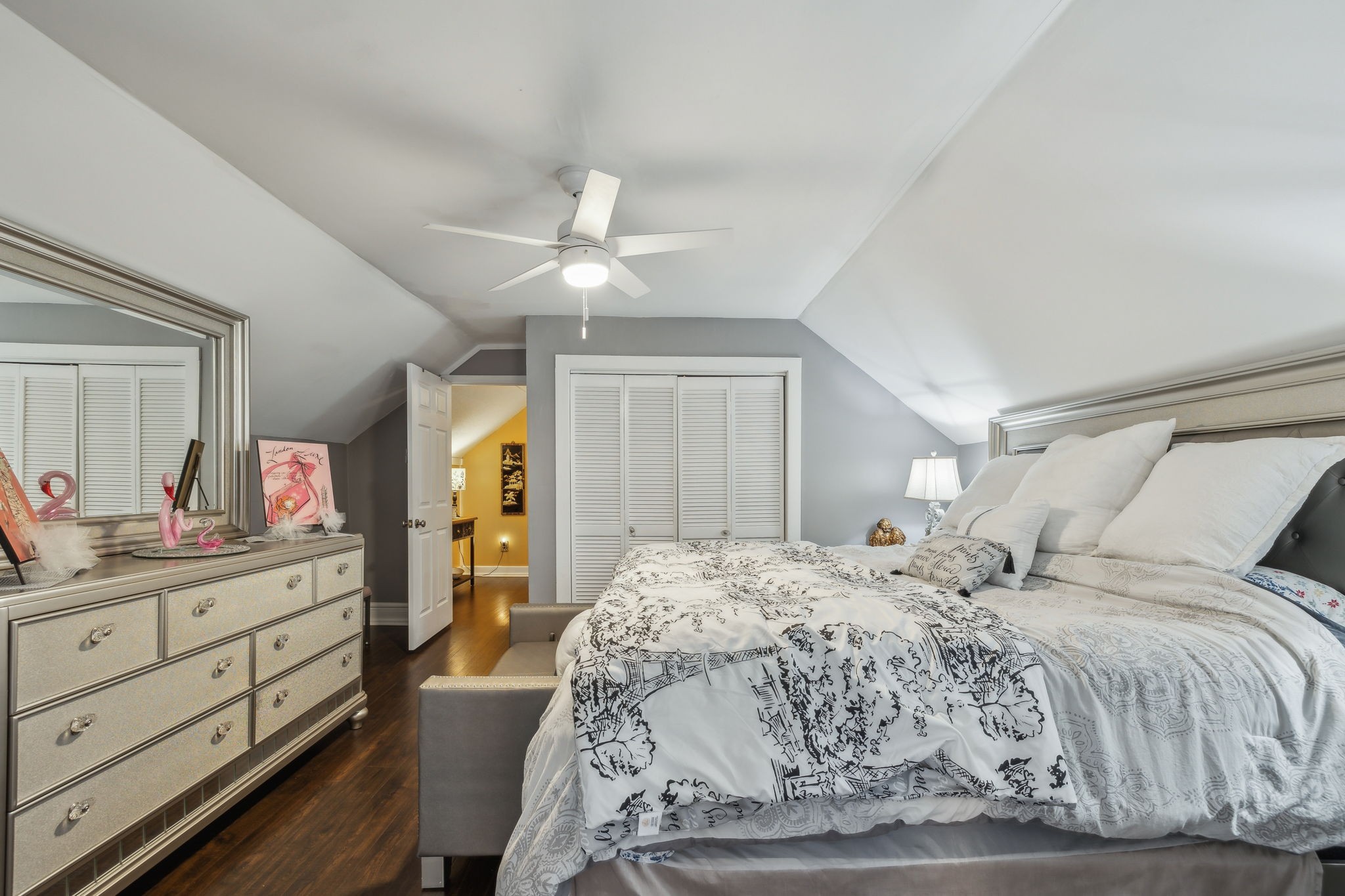 479 Elora Road Elora, TN 37328 - Photo 34 of 57 a bedroom with a large bed and a chandelier