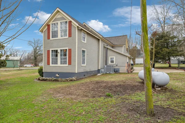 a view of a building with a big yard