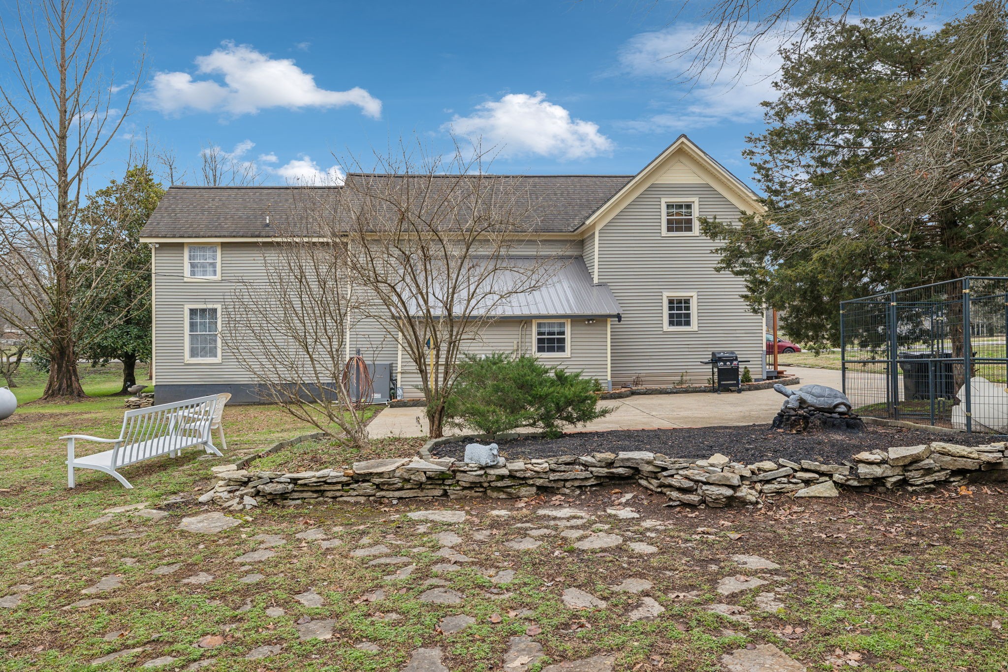 479 Elora Road Elora, TN 37328 - Photo 44 of 57 a view of a white house with a yard