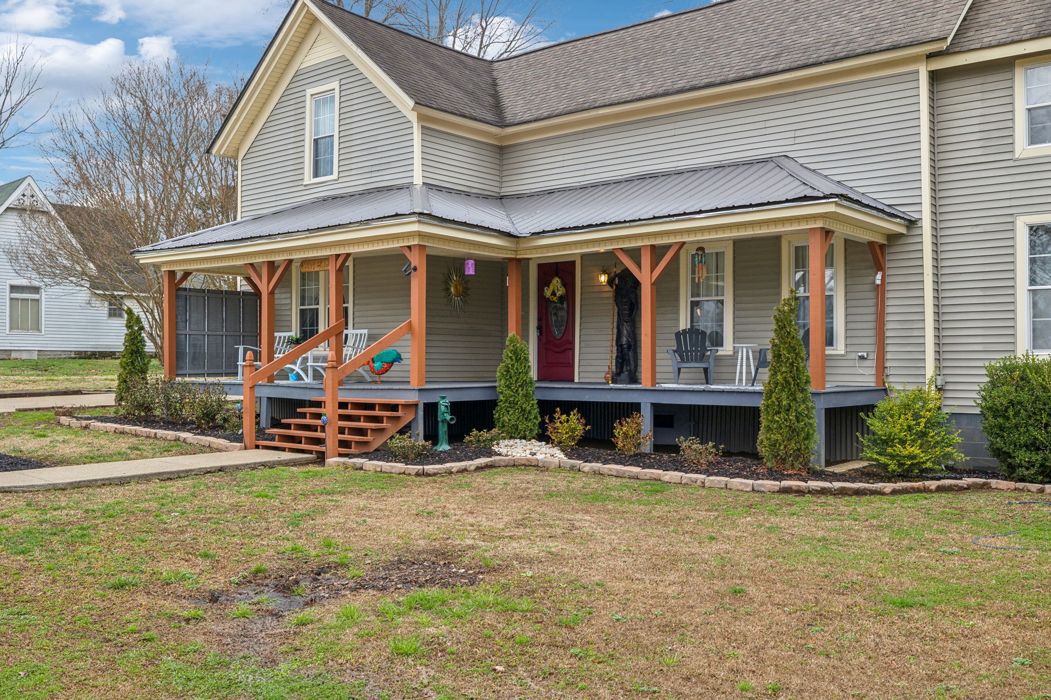 479 Elora Road Elora, TN 37328 - Photo 5 of 57 a view of a house with wooden walls and a bench