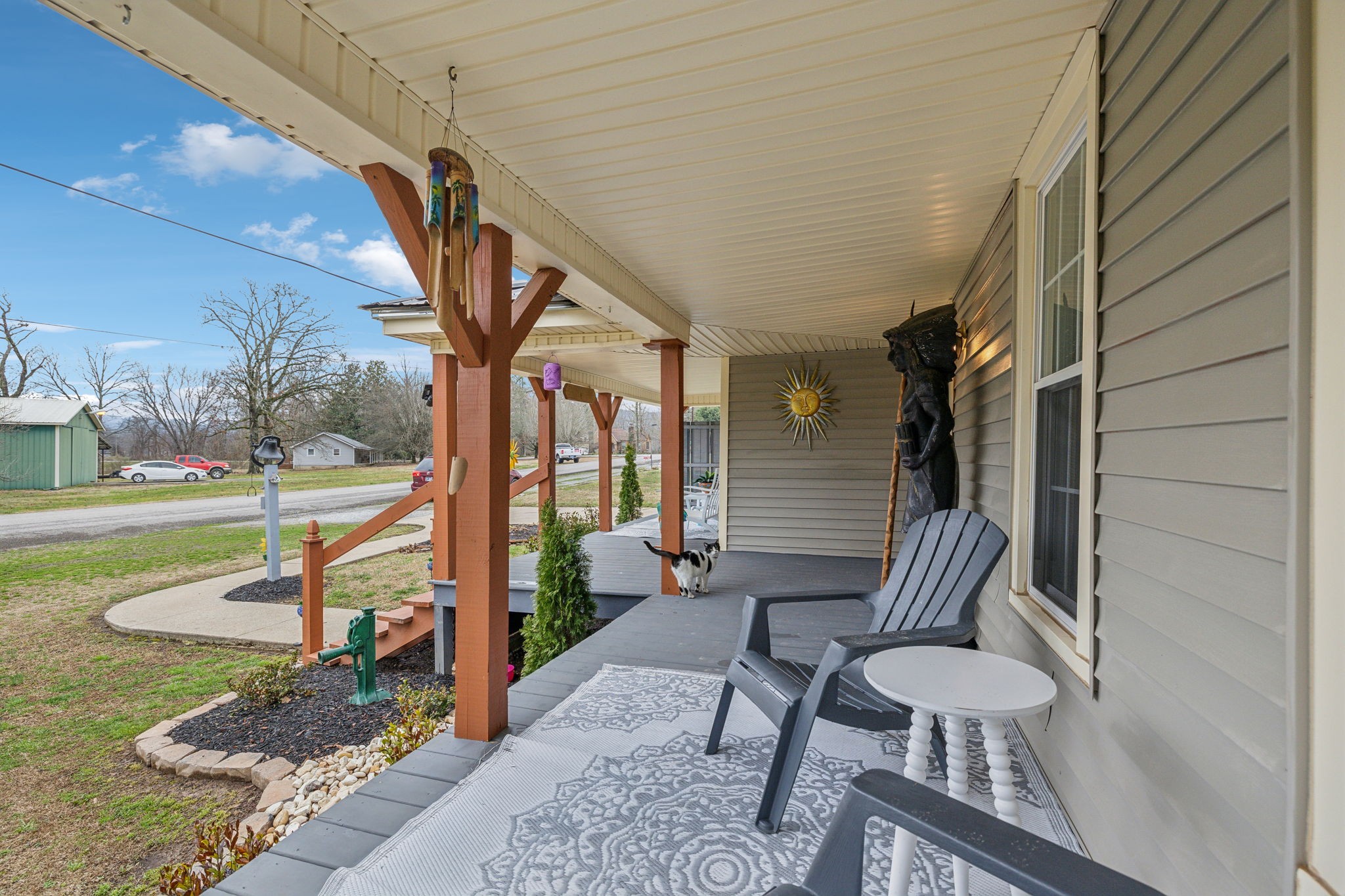 479 Elora Road Elora, TN 37328 - Photo 7 of 57 a view of a porch with furniture and garden