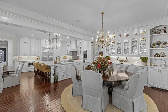 a living room with furniture fireplace and flat screen tv