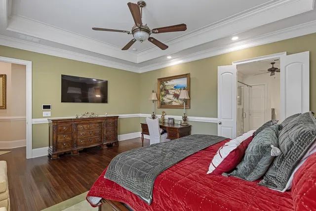 a bathroom with a double vanity sink toilet and shower