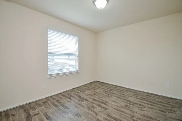 an empty room with a window