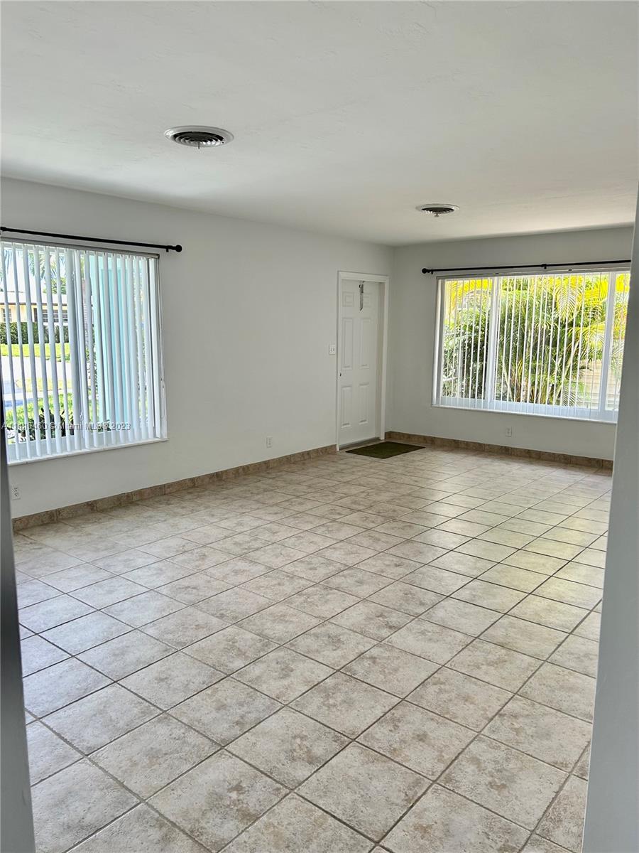 3790 Polk Street Hollywood, FL 33021 - Photo 11 of 23 a view of an empty room and a window