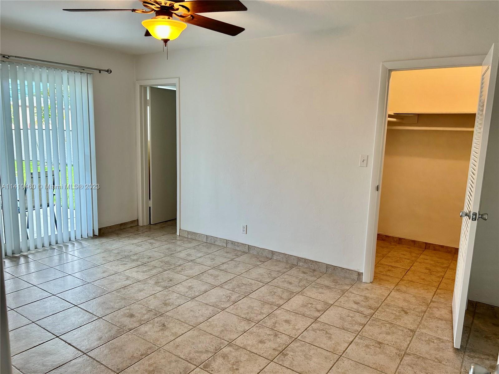 3790 Polk Street Hollywood, FL 33021 - Photo 16 of 23 an empty room with a window