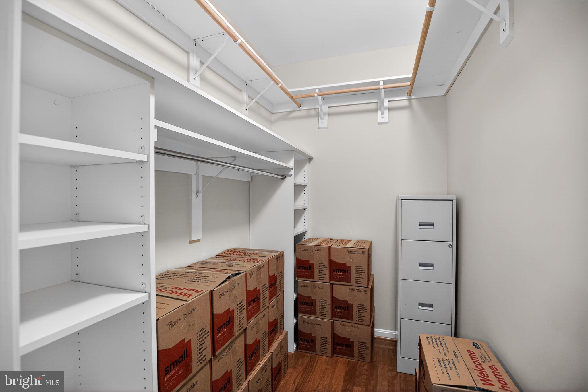723 Runabout Loop, Unit 723 Solomons, MD 20688 - Photo 20 of 46 Dual walk-in closets with built-in closet systems