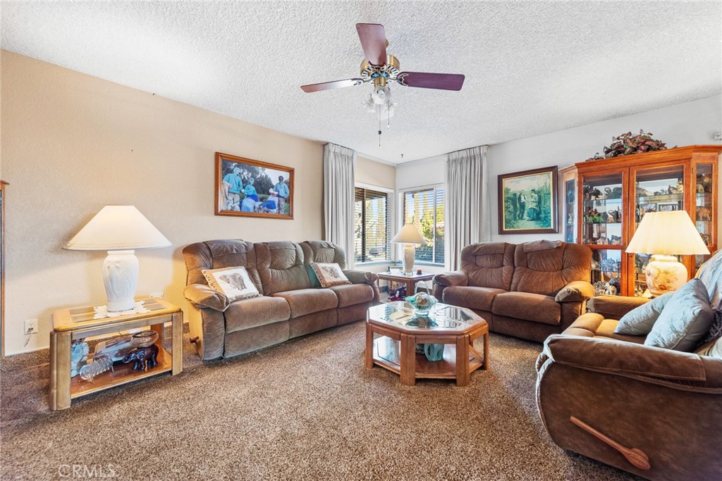 18200 Van Buren Boulevard Riverside, CA 92508 - Photo 15 of 56 a living room with furniture and a large window