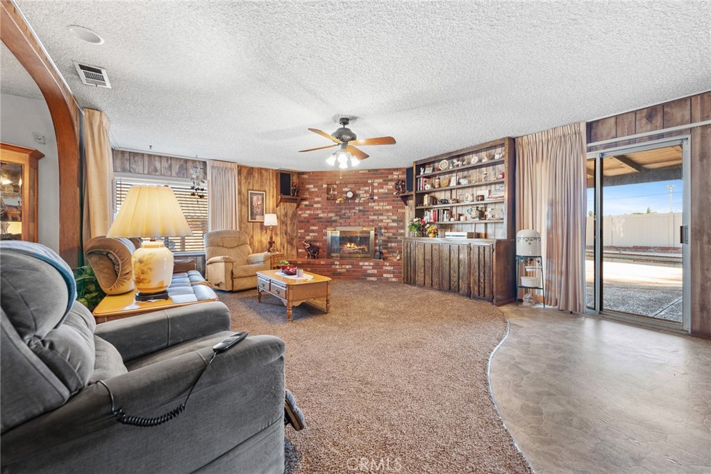 18200 Van Buren Boulevard Riverside, CA 92508 - Photo 16 of 56 a living room with furniture and a chandelier