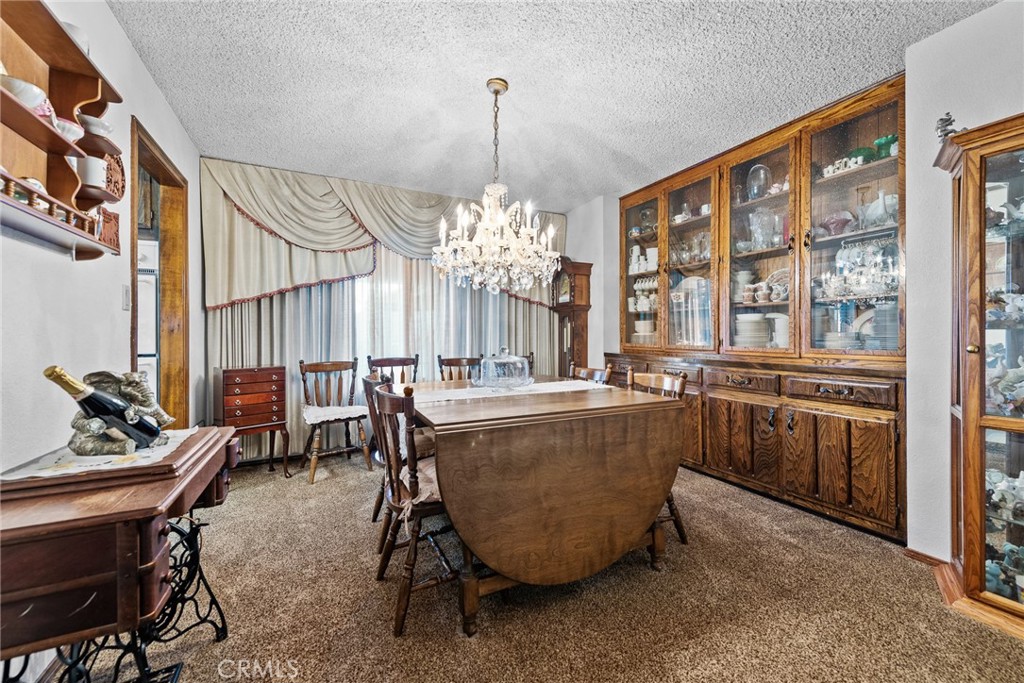 18200 Van Buren Boulevard Riverside, CA 92508 - Photo 18 of 56 a dining room with furniture and window