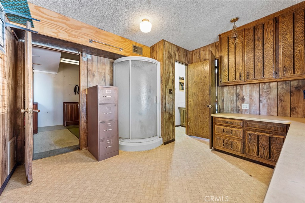 18200 Van Buren Boulevard Riverside, CA 92508 - Photo 45 of 56 a spacious bathroom with a granite countertop sink and a large mirror