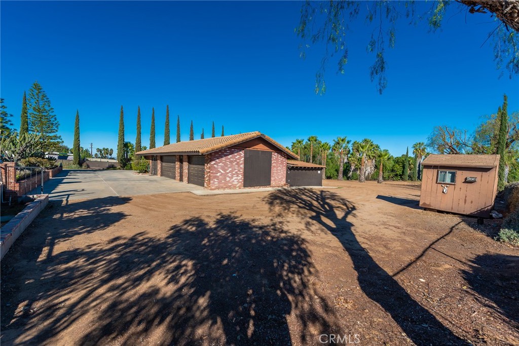 18200 Van Buren Boulevard Riverside, CA 92508 - Photo 50 of 56 a view of a house with a yard