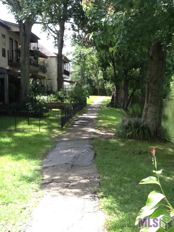 2014 Lac Cache Court Baton Rouge, LA 70816 - Photo 32 of 32 Trail around lake