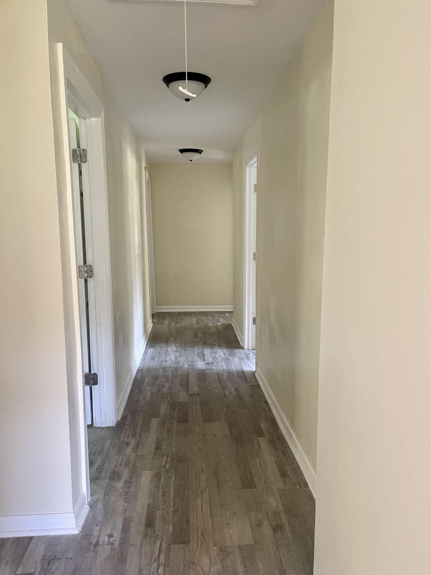 425 Rosa Hill Street Edgefield, SC 29824 - Photo 7 of 14 a view of hallway with wooden floor