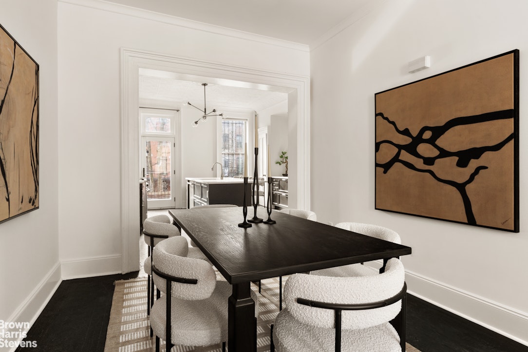 738 Madison Street Brooklyn, NY 11221 - Photo 3 of 14 a dining room with furniture and wooden floor