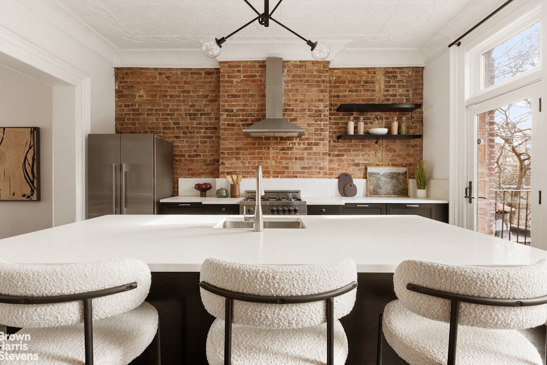 738 Madison Street Brooklyn, NY 11221 - Photo 5 of 14 a dining room with furniture and window