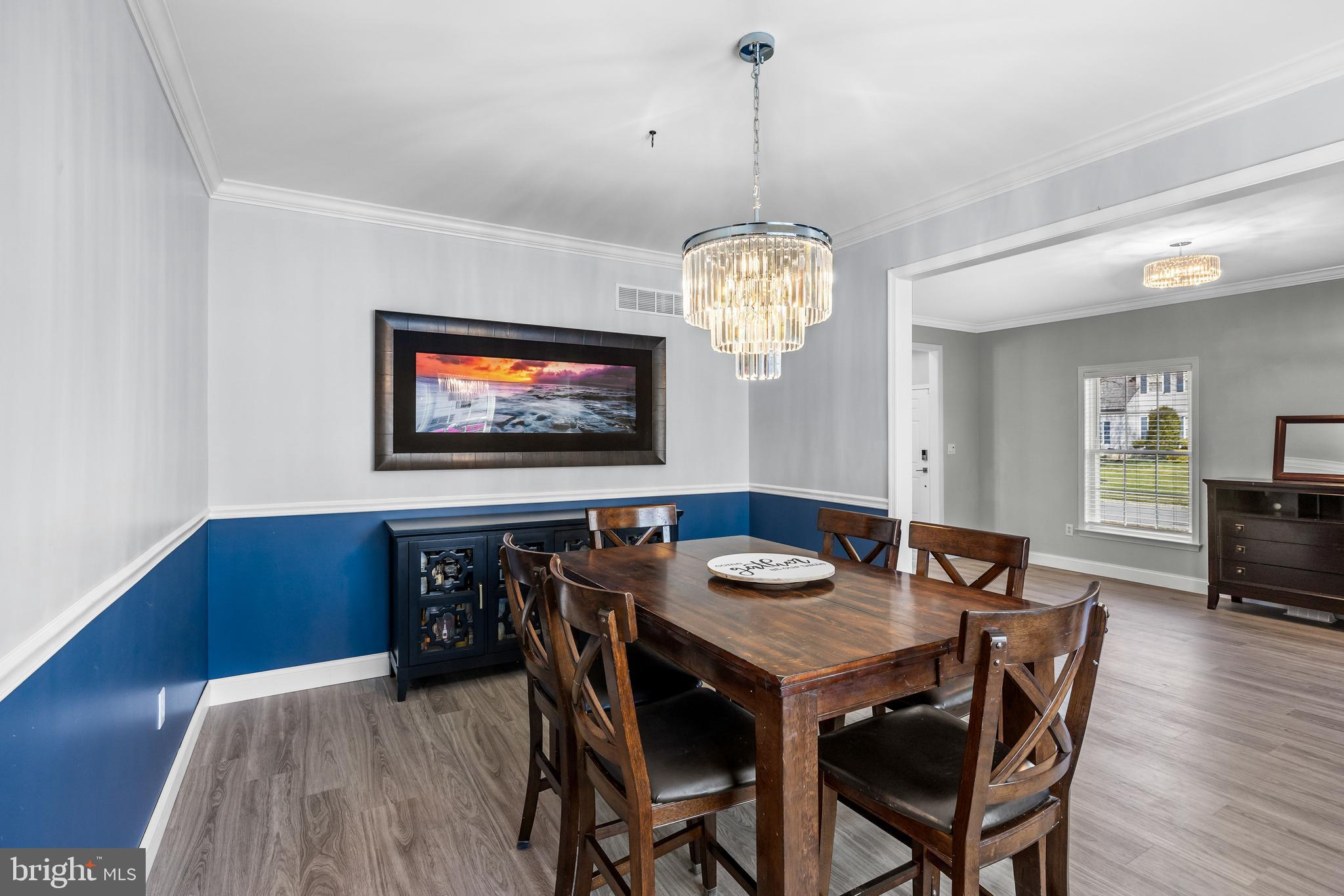 15 Millway Road Lumberton, NJ 08048 - Photo 18 of 66 a view of a dining room with furniture wooden floor and chandelier