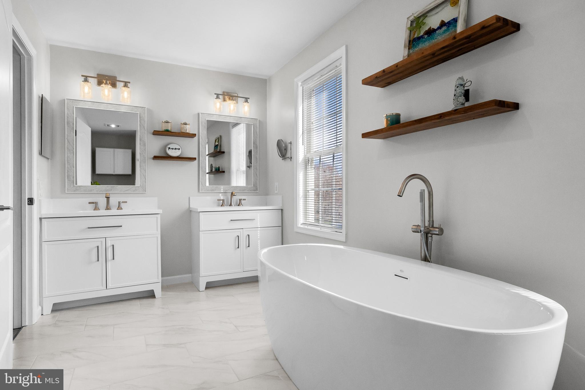 15 Millway Road Lumberton, NJ 08048 - Photo 29 of 66 a white bath tub sitting in a bathroom