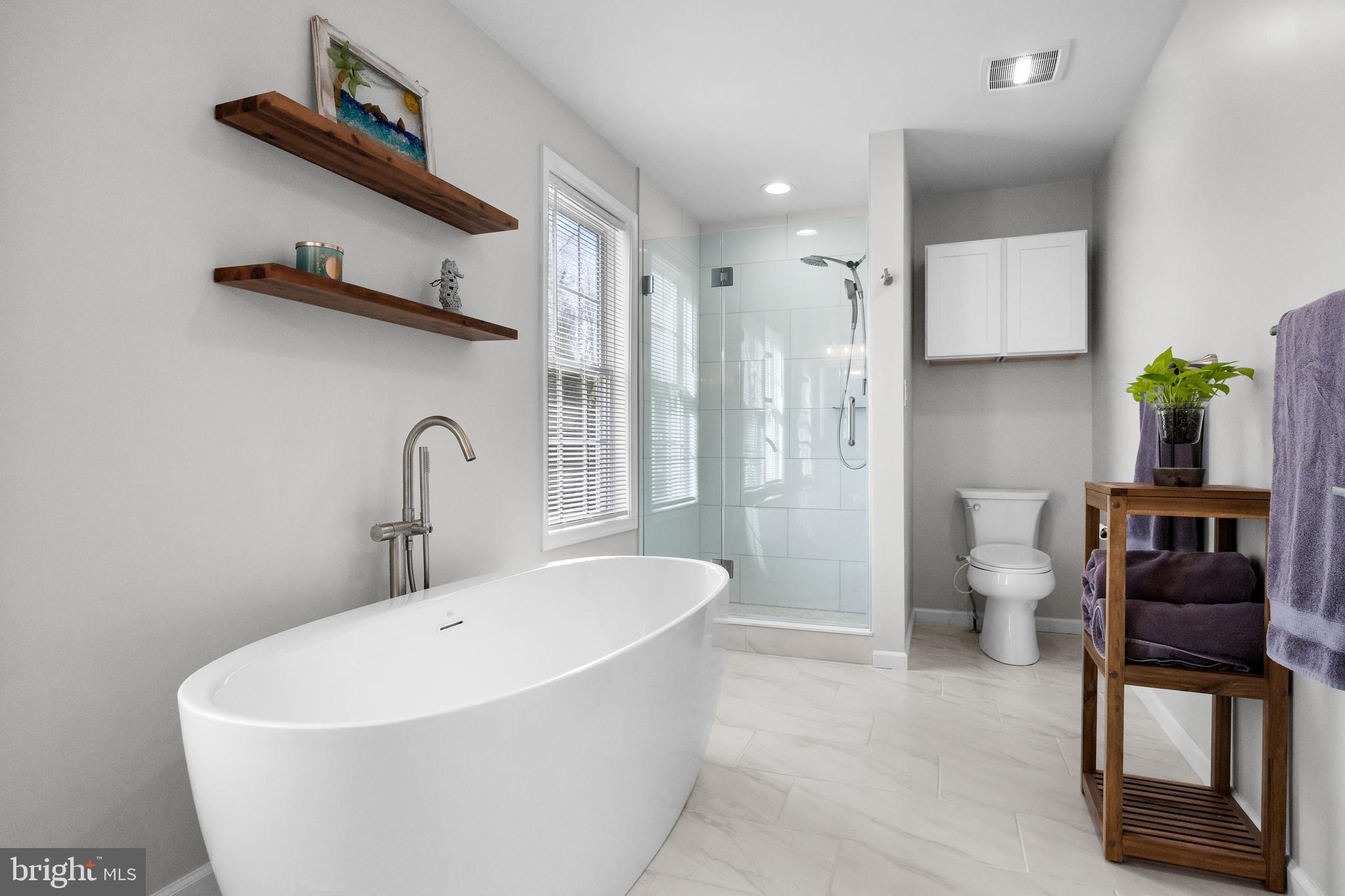 15 Millway Road Lumberton, NJ 08048 - Photo 31 of 66 a white bath tub sitting next to a toilet