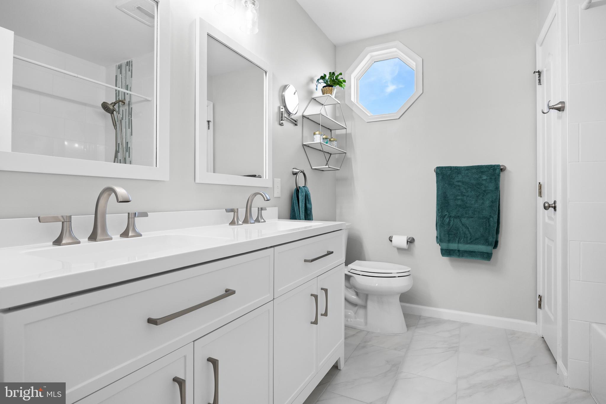15 Millway Road Lumberton, NJ 08048 - Photo 34 of 66 a bathroom with a sink vanity and a mirror