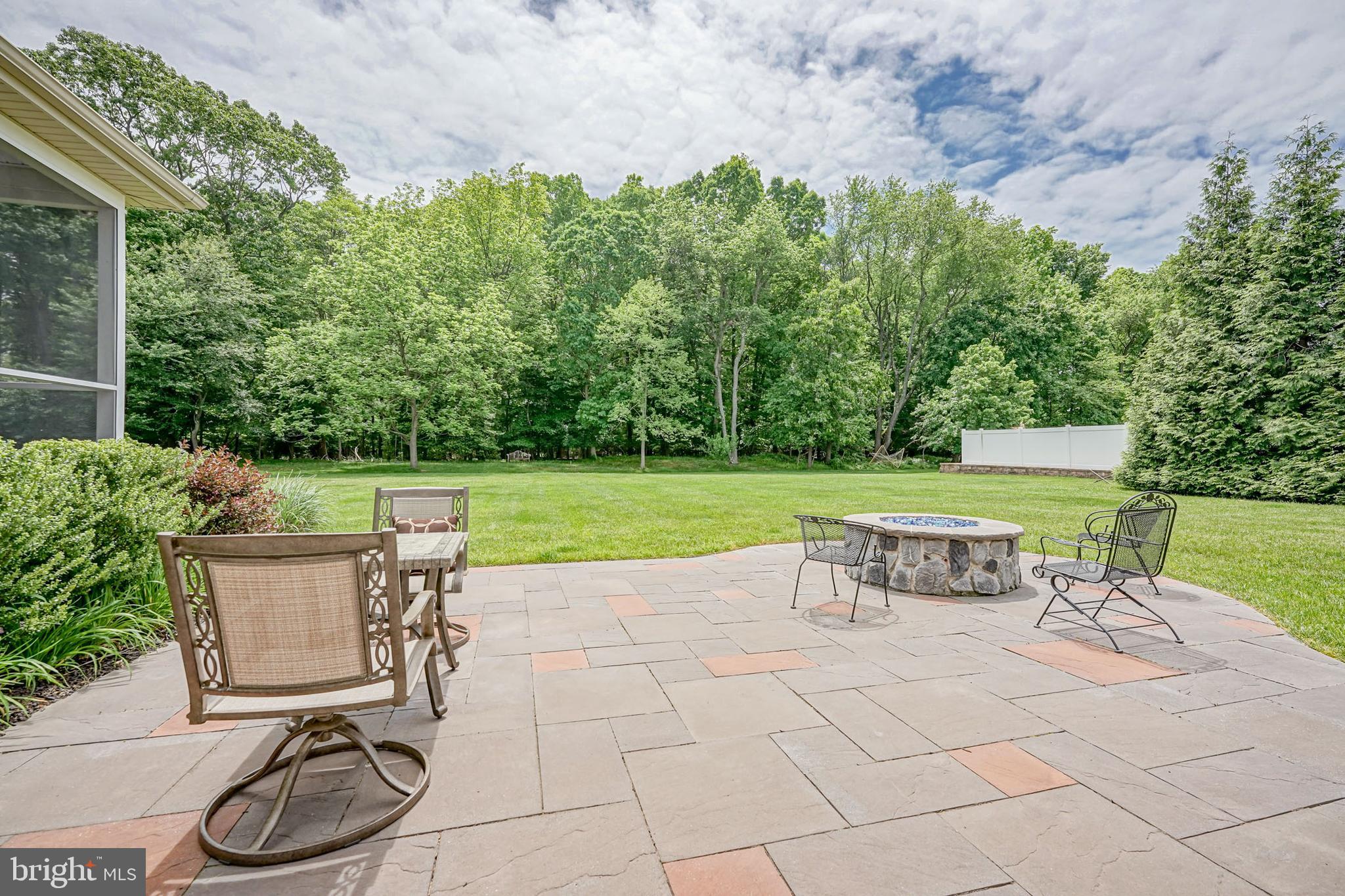 15 Millway Road Lumberton, NJ 08048 - Photo 44 of 66 a view of a chair and table on the garden