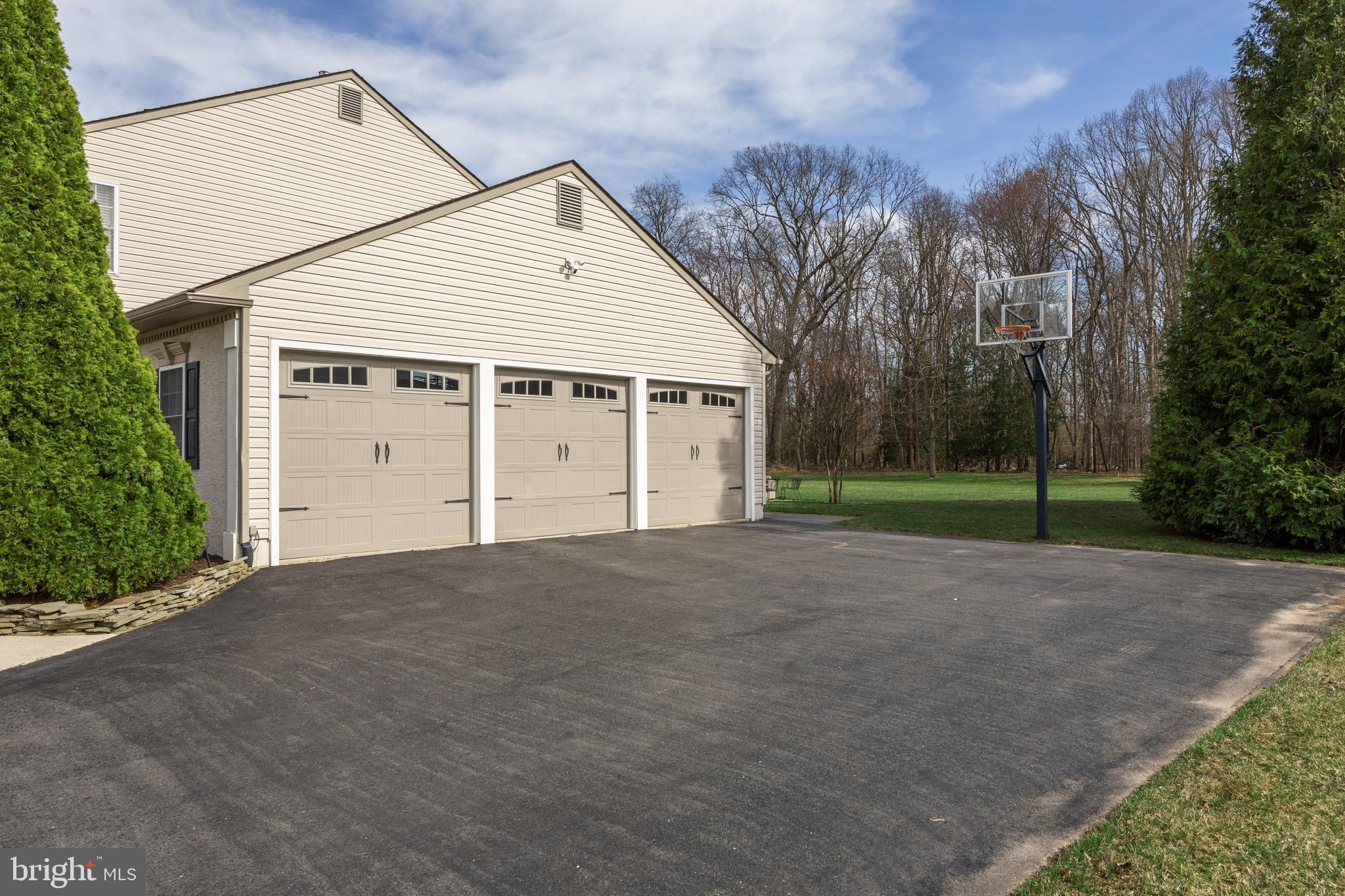 15 Millway Road Lumberton, NJ 08048 - Photo 47 of 66 a view of a house with a yard and garage
