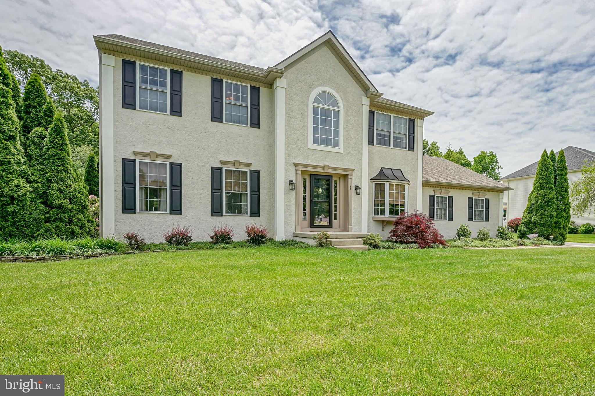 15 Millway Road Lumberton, NJ 08048 - Photo 65 of 66 a front view of a house with a garden