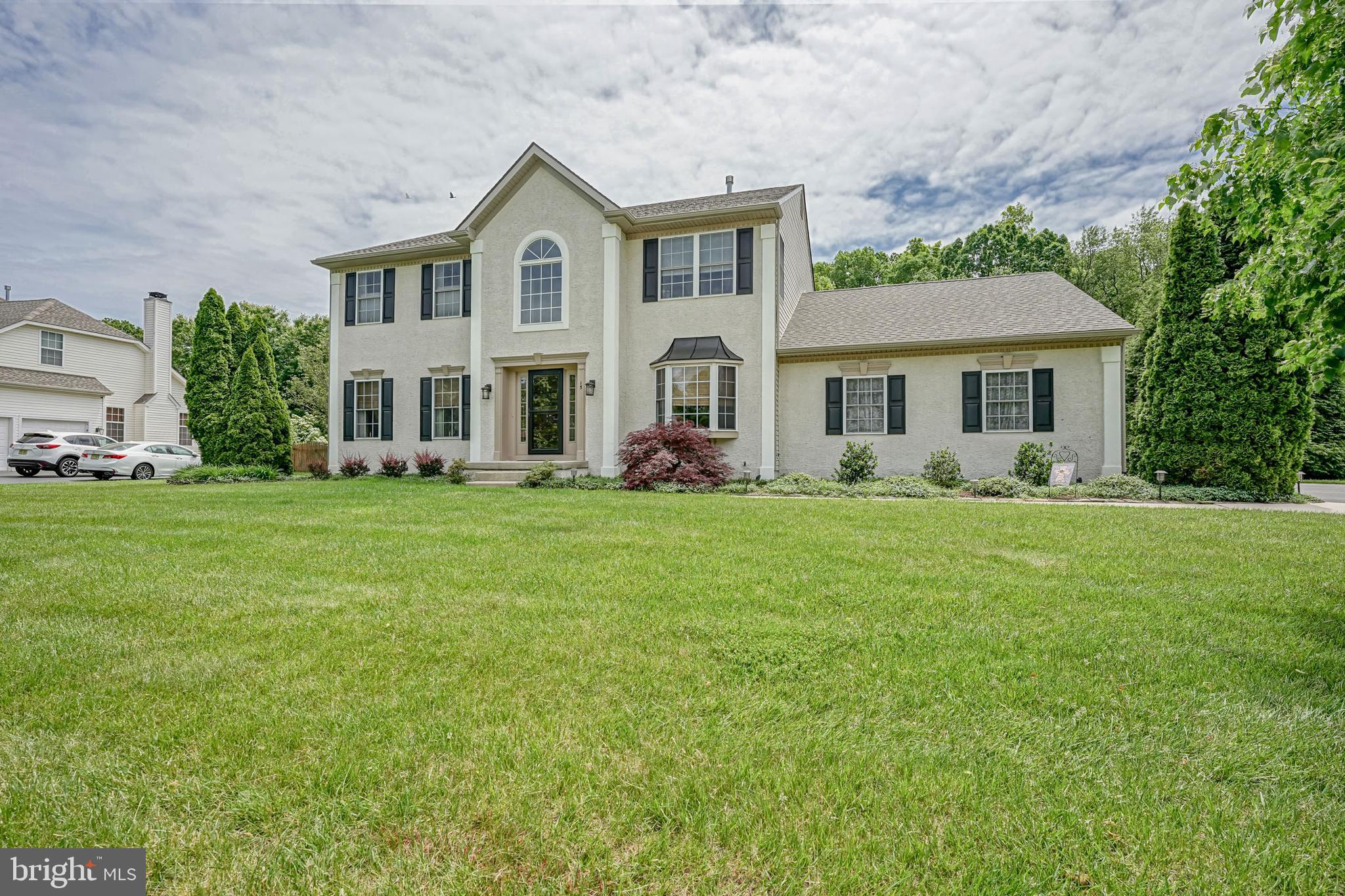 15 Millway Road Lumberton, NJ 08048 - Photo 66 of 66 a front view of a house with garden and trees