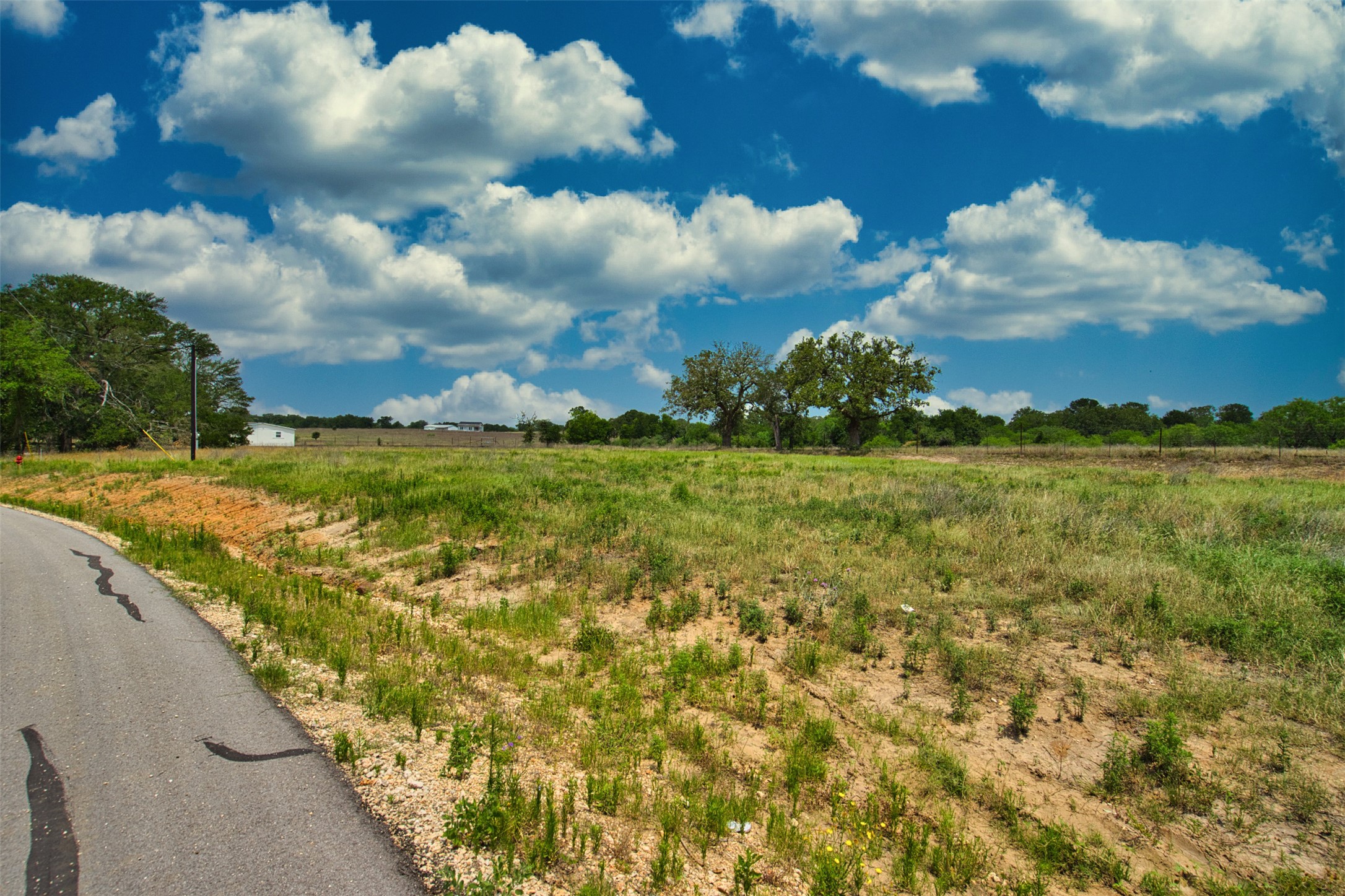 534 Ferguson Loop Dale Dale, TX 78616 - Photo 6 of 15 a view of a lake with beach