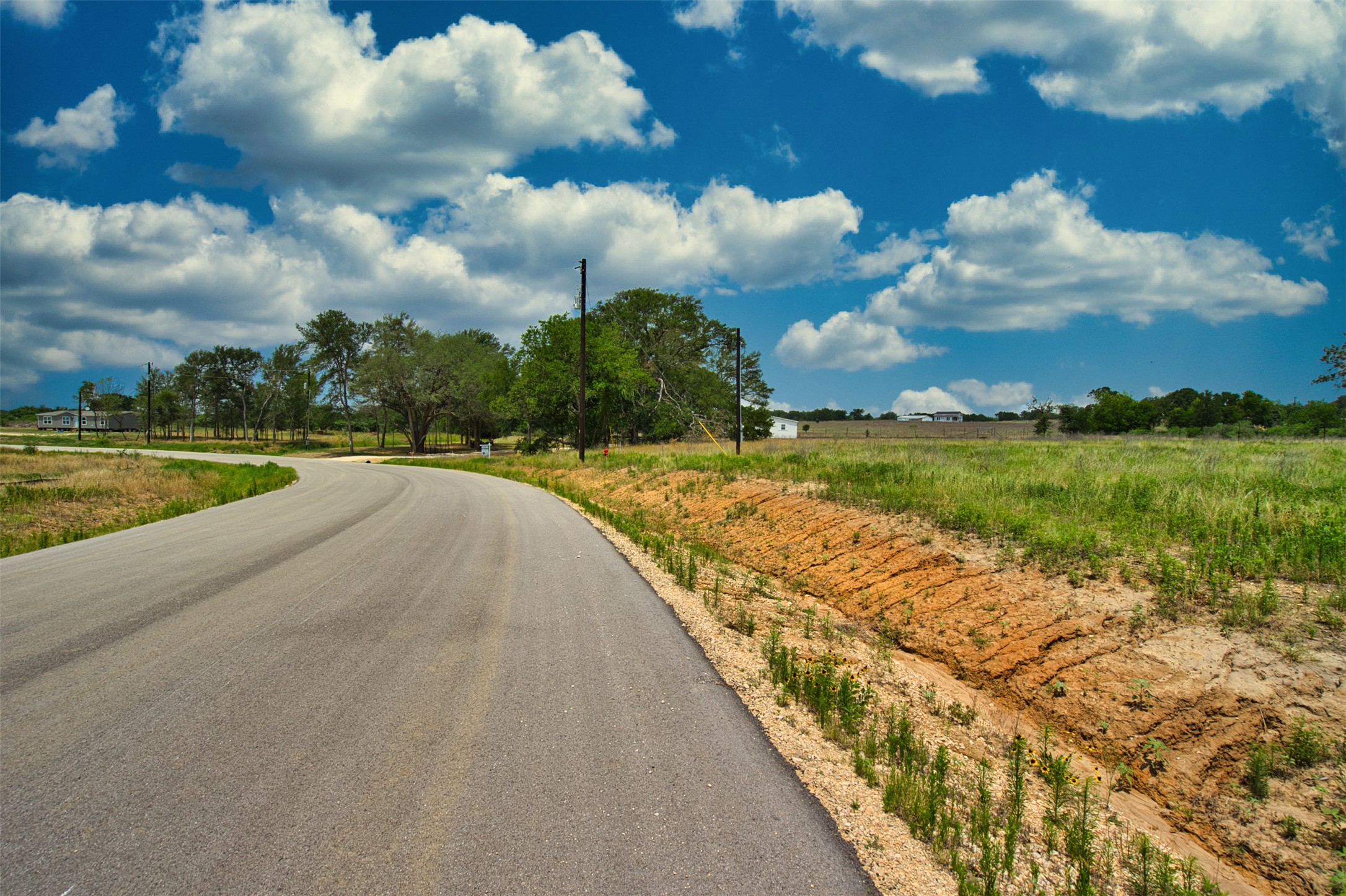 534 Ferguson Loop Dale Dale, TX 78616 - Photo 9 of 15 a view of a lake with a big yard