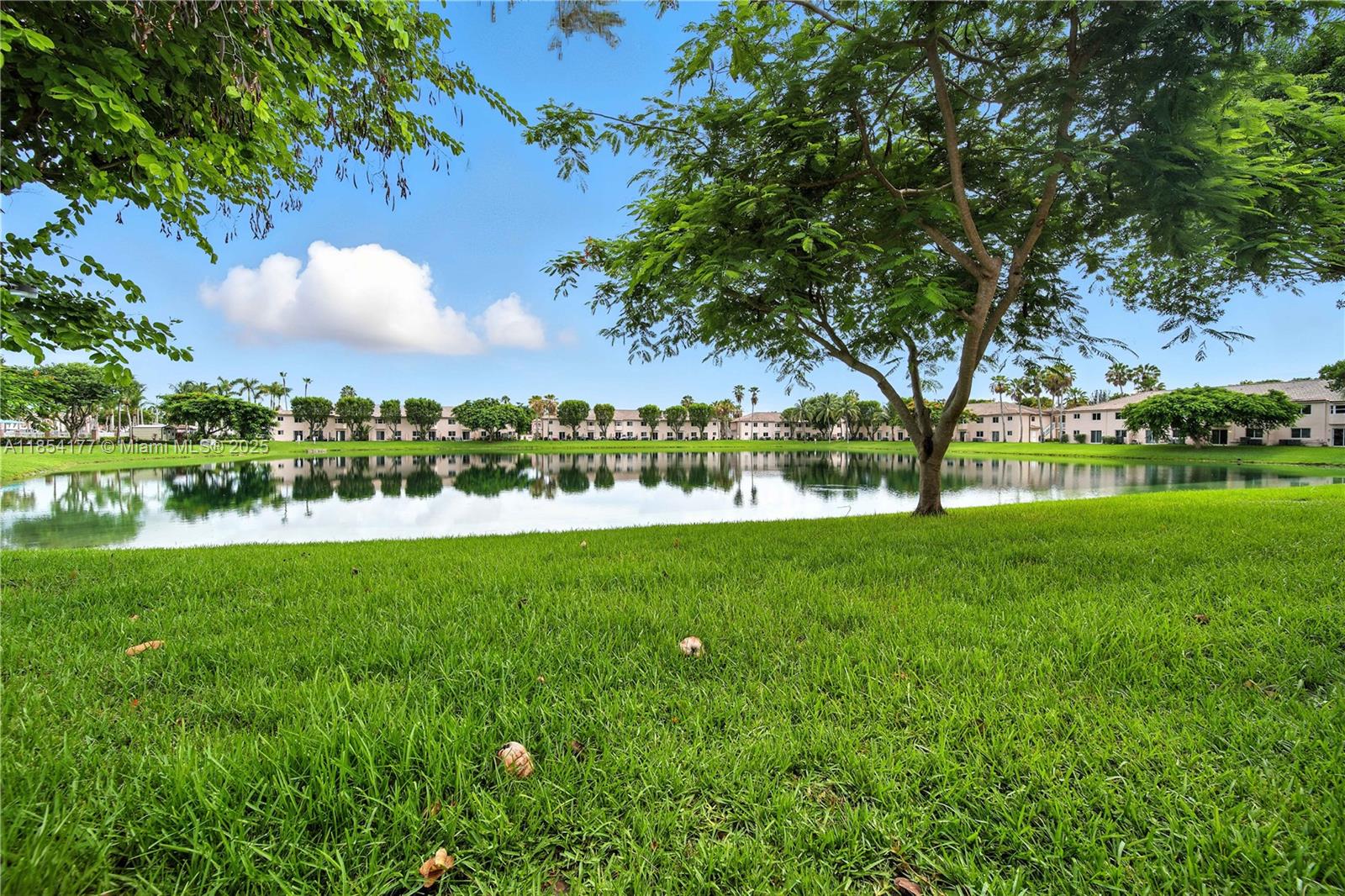 1270 Southeast 26th Street, Unit 101 Homestead, FL 33035 - Photo 15 of 18 a view of yard with green space