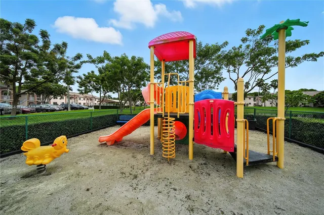 a view of a park with slide