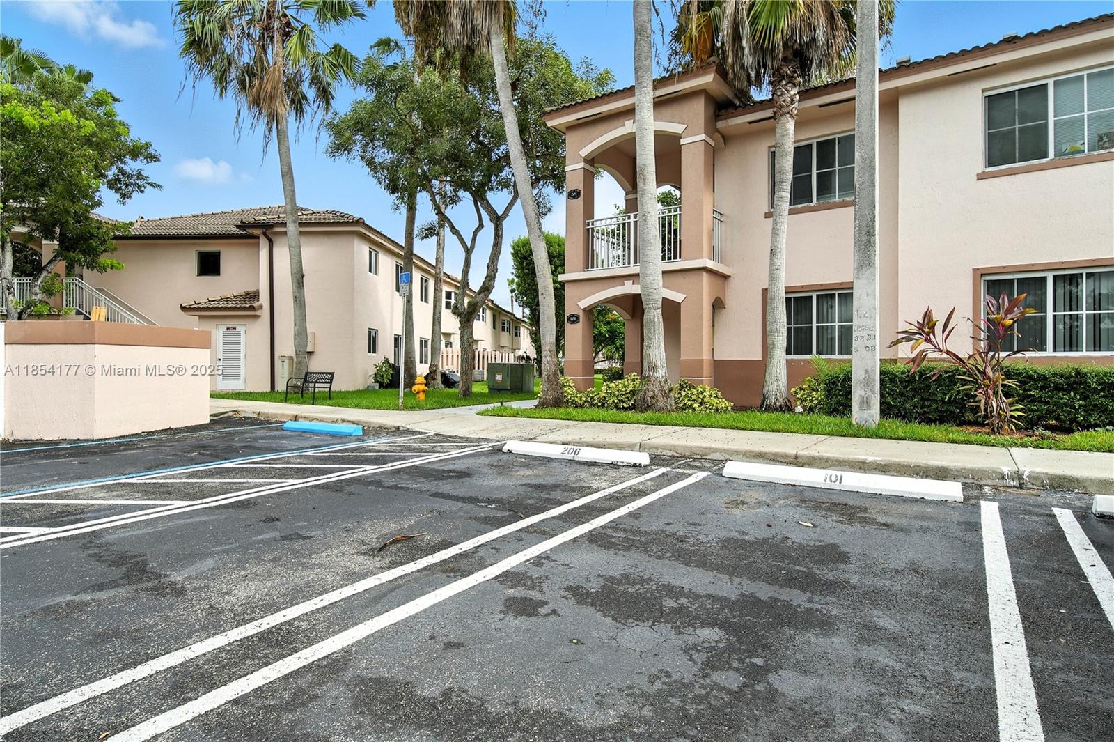 1270 Southeast 26th Street, Unit 101 Homestead, FL 33035 - Photo 18 of 18 front view of a house with a street