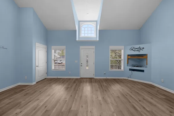 an empty room with windows