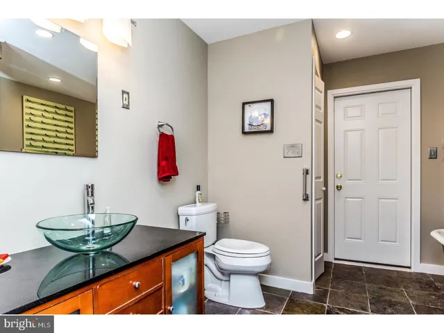 a bathroom with a sink and a toilet