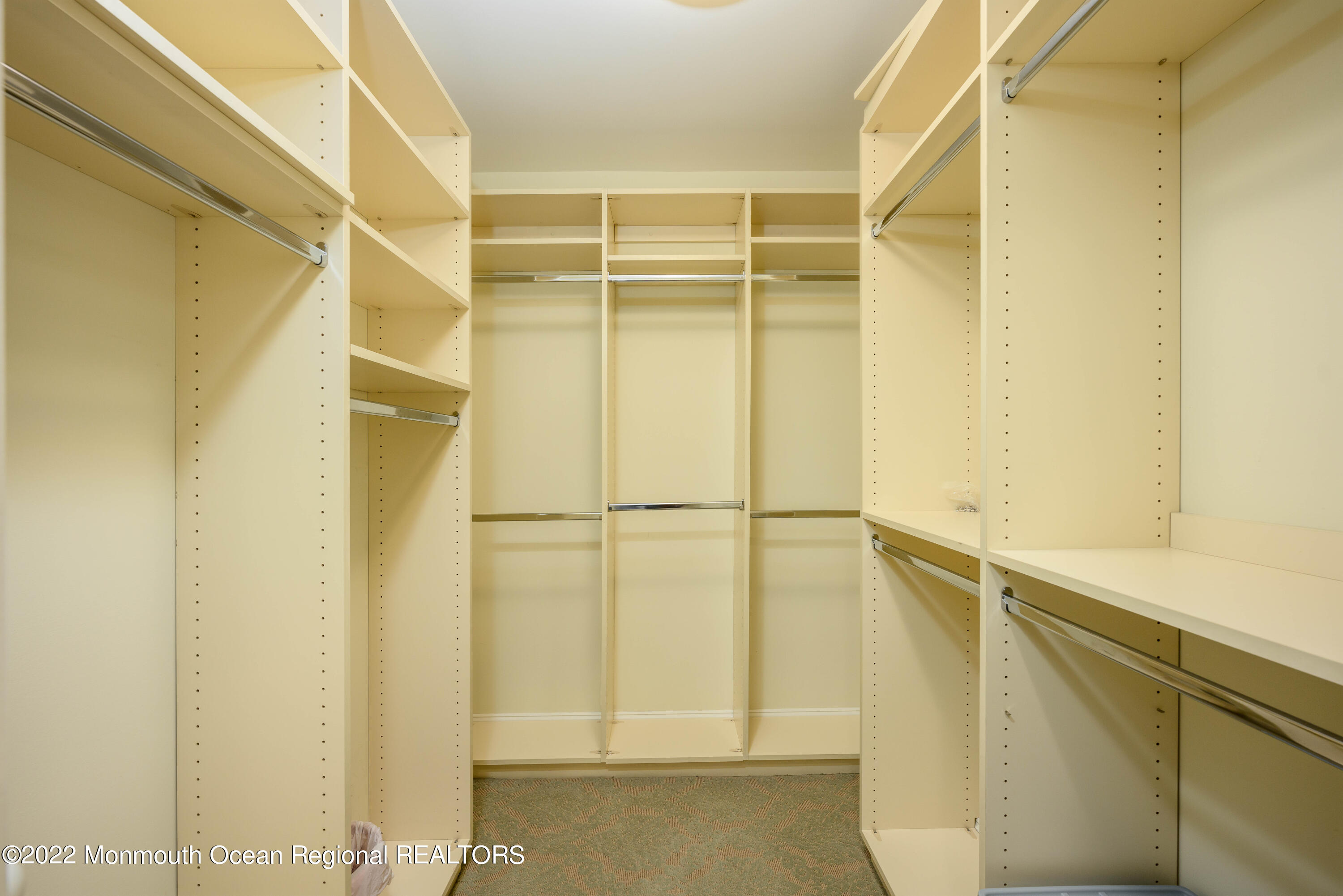 2002 Nassau Drive Spring Lake, NJ 07762 - Photo 20 of 43 a view of walk in closet with empty racks
