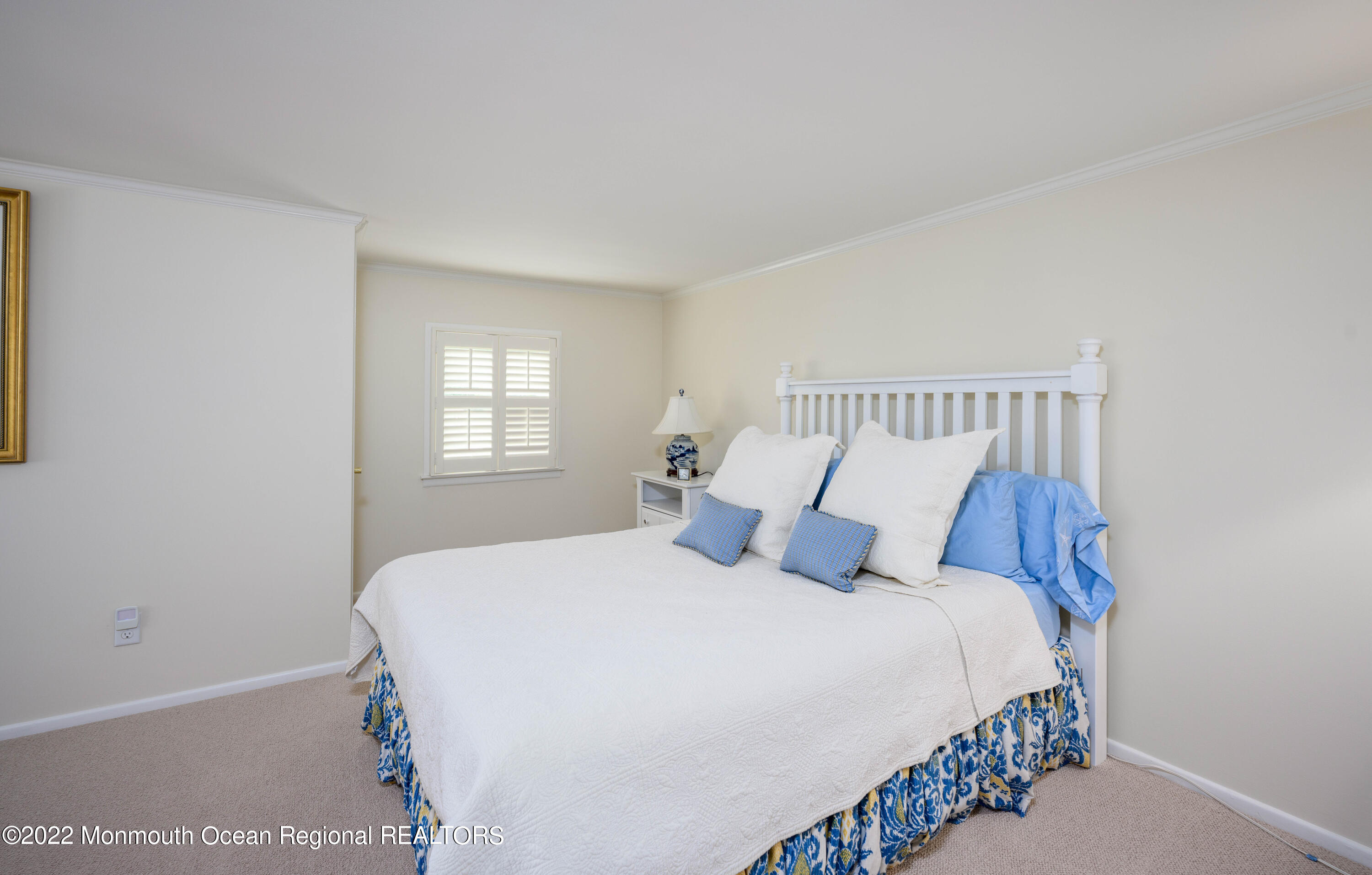 2002 Nassau Drive Spring Lake, NJ 07762 - Photo 22 of 43 a bedroom with a bed and window