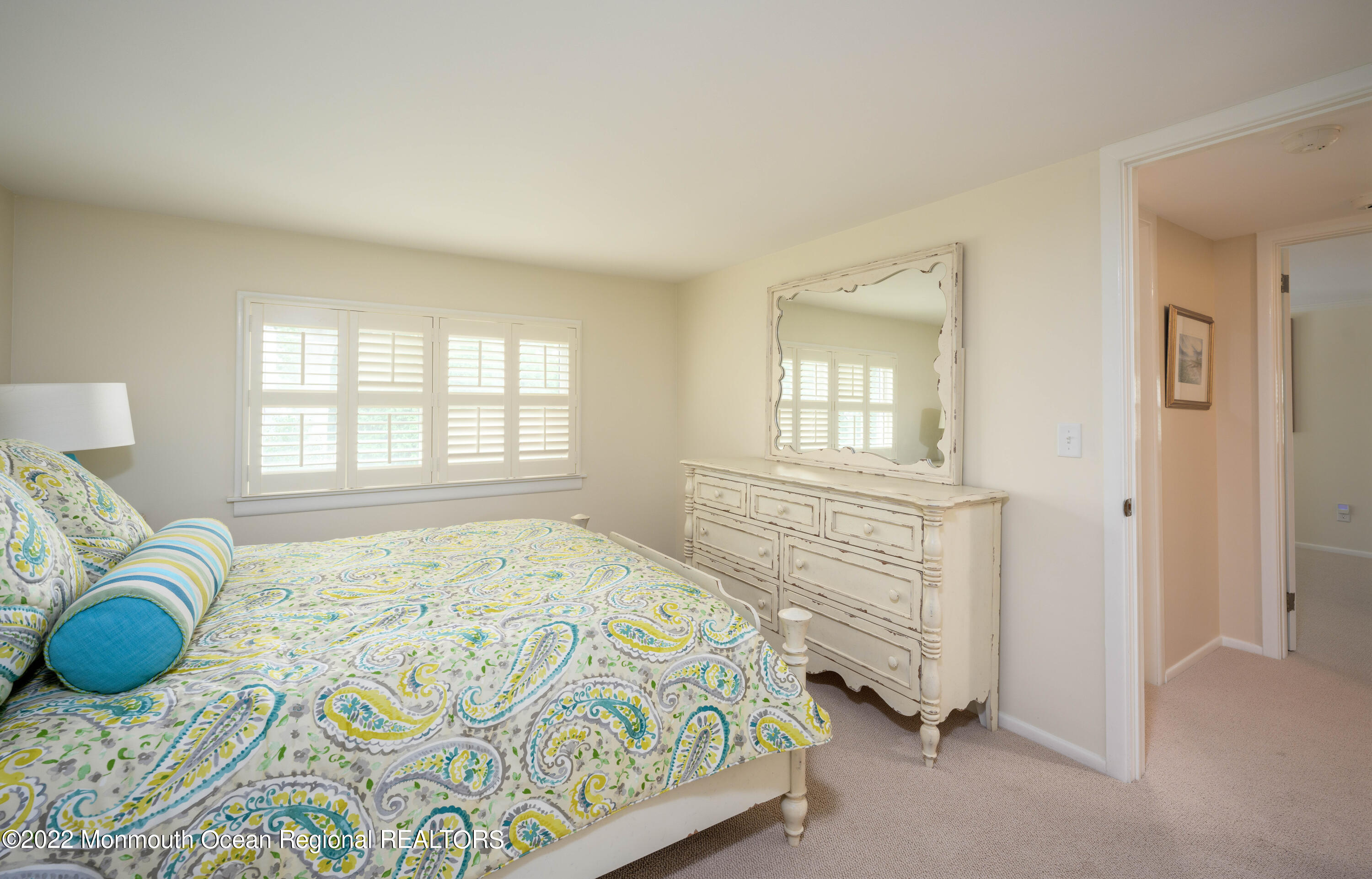 2002 Nassau Drive Spring Lake, NJ 07762 - Photo 28 of 43 a bedroom with a bed and a window